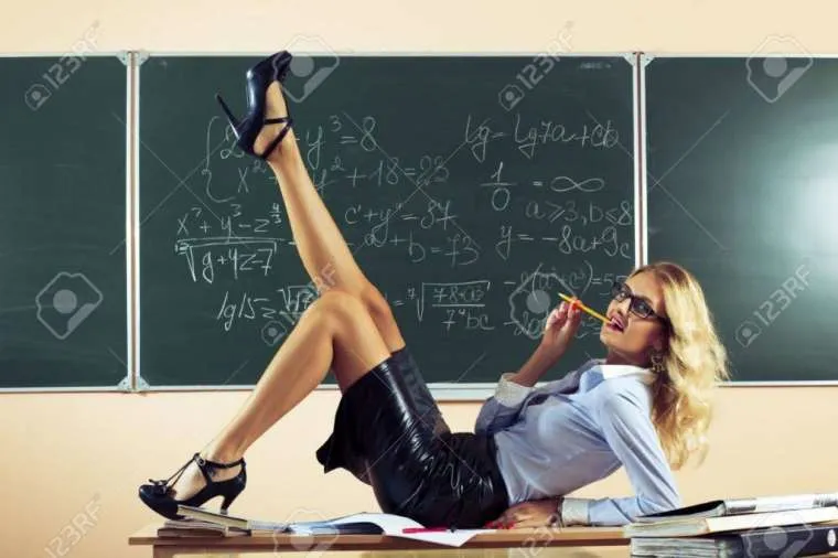 21999593 beautiful young sexy teacher posing on table