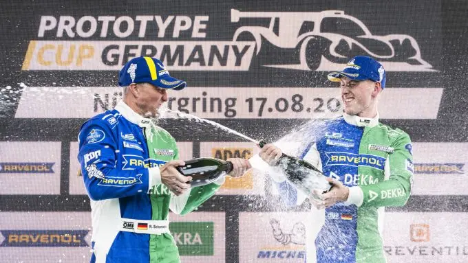 1 ralf and david schumacher celebrate their victory