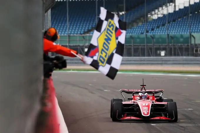 1 slater crosses the line to win race one at silverstone