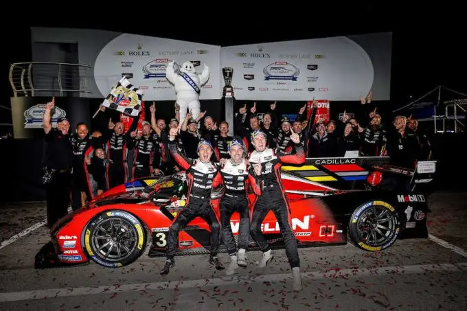 1 winners nr31 cadillac whelen cadillac v seriesr gtp jack aitken earl bamber frederik vesti celebrate in victory lane levitt plm 1025 081460
