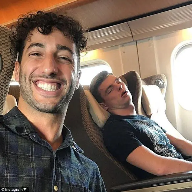 4507364700000578 0 daniel ricciardo poses for a selfie with sleeping red bull team a 26 1507122077445