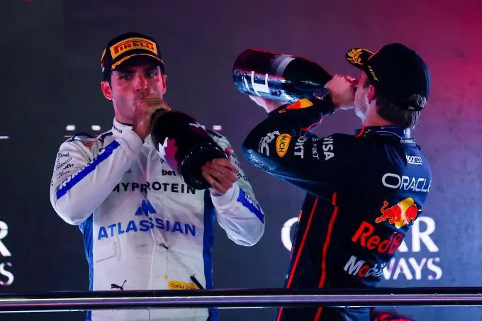 carlos sainz podium champagne