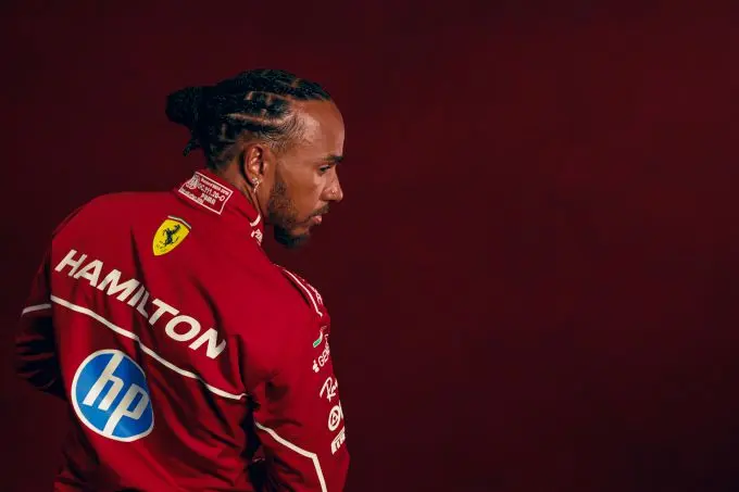 lewis hamilton 2025 red background 03 ab77fc9f 6599 4f54 81e5 10ec1f7588ea