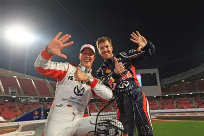 michael schumacher and sebastian vettel celebrate