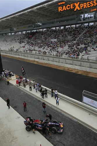red bull racing in the pit lane in korea