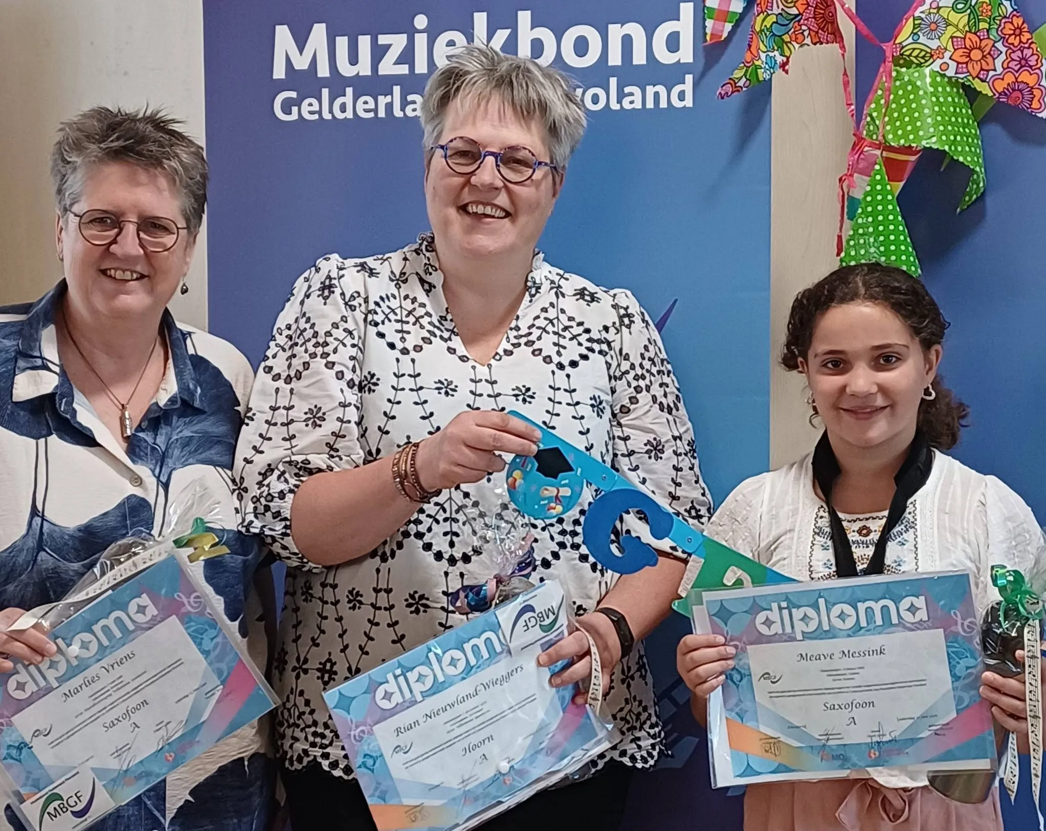 Geslaagden Examen Muziekvereniging Wilhelmina Spankeren