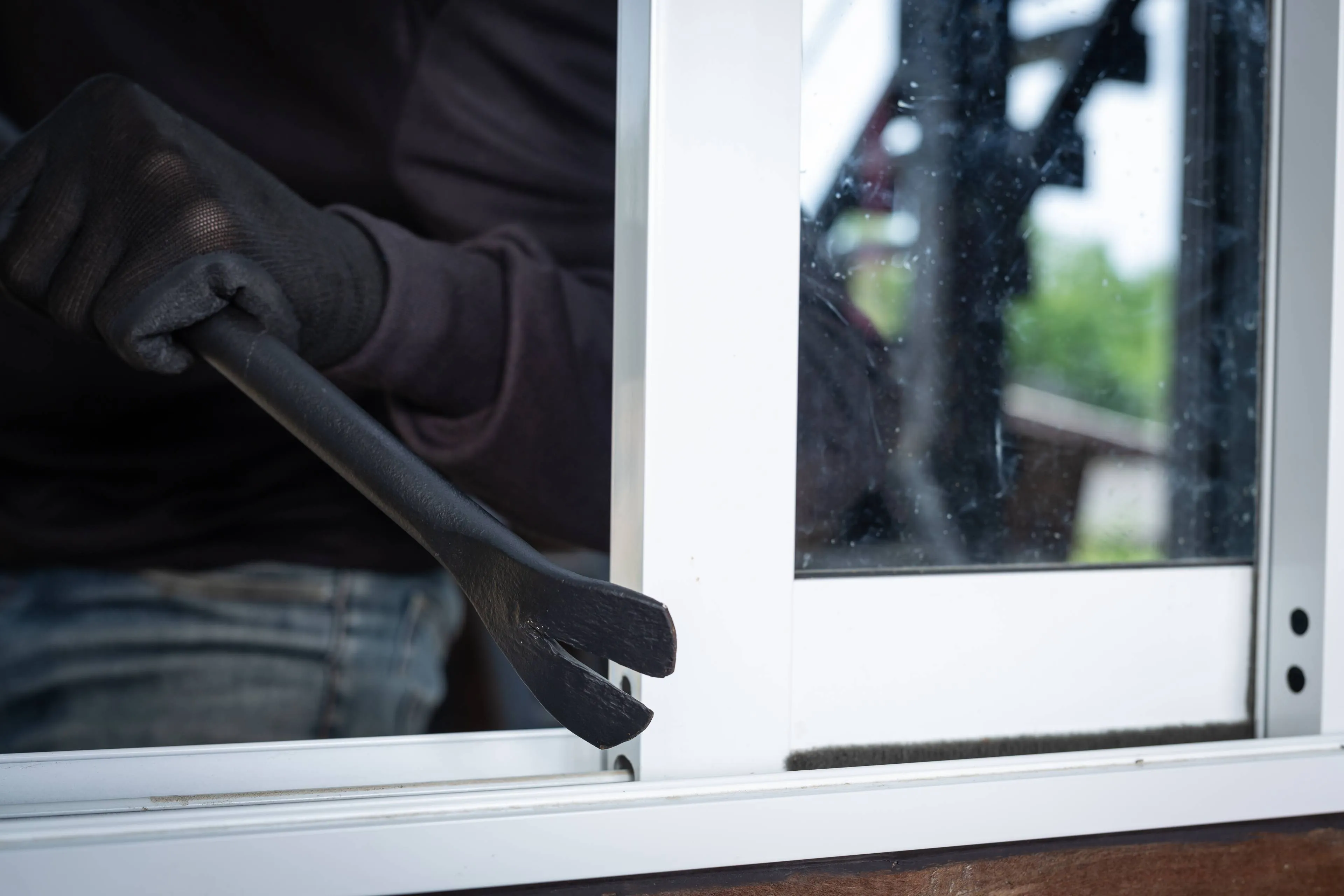 thieves wear black hats pry windows steal things 1