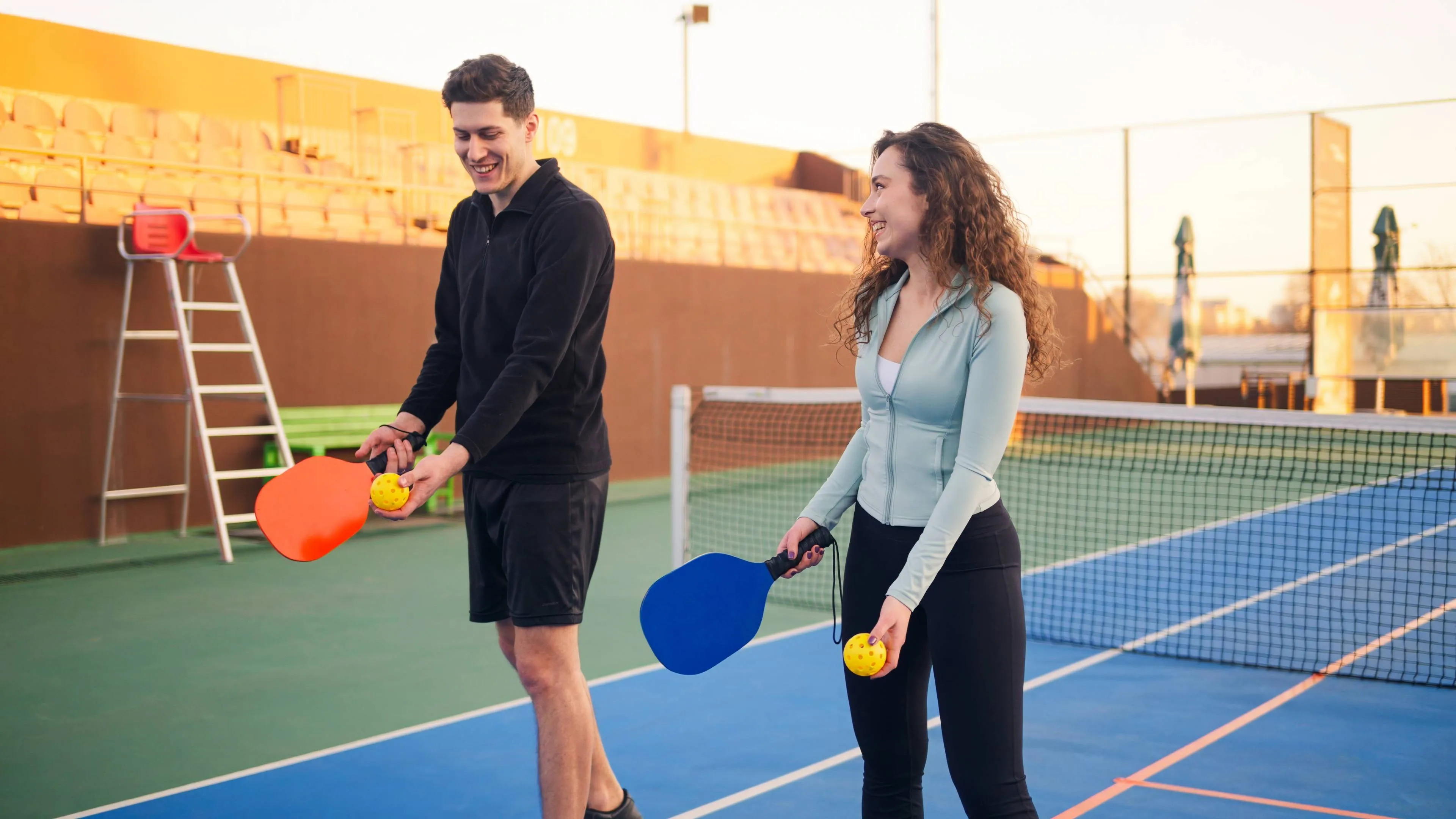 young-adults-teaching-learning-how-play-pickleball