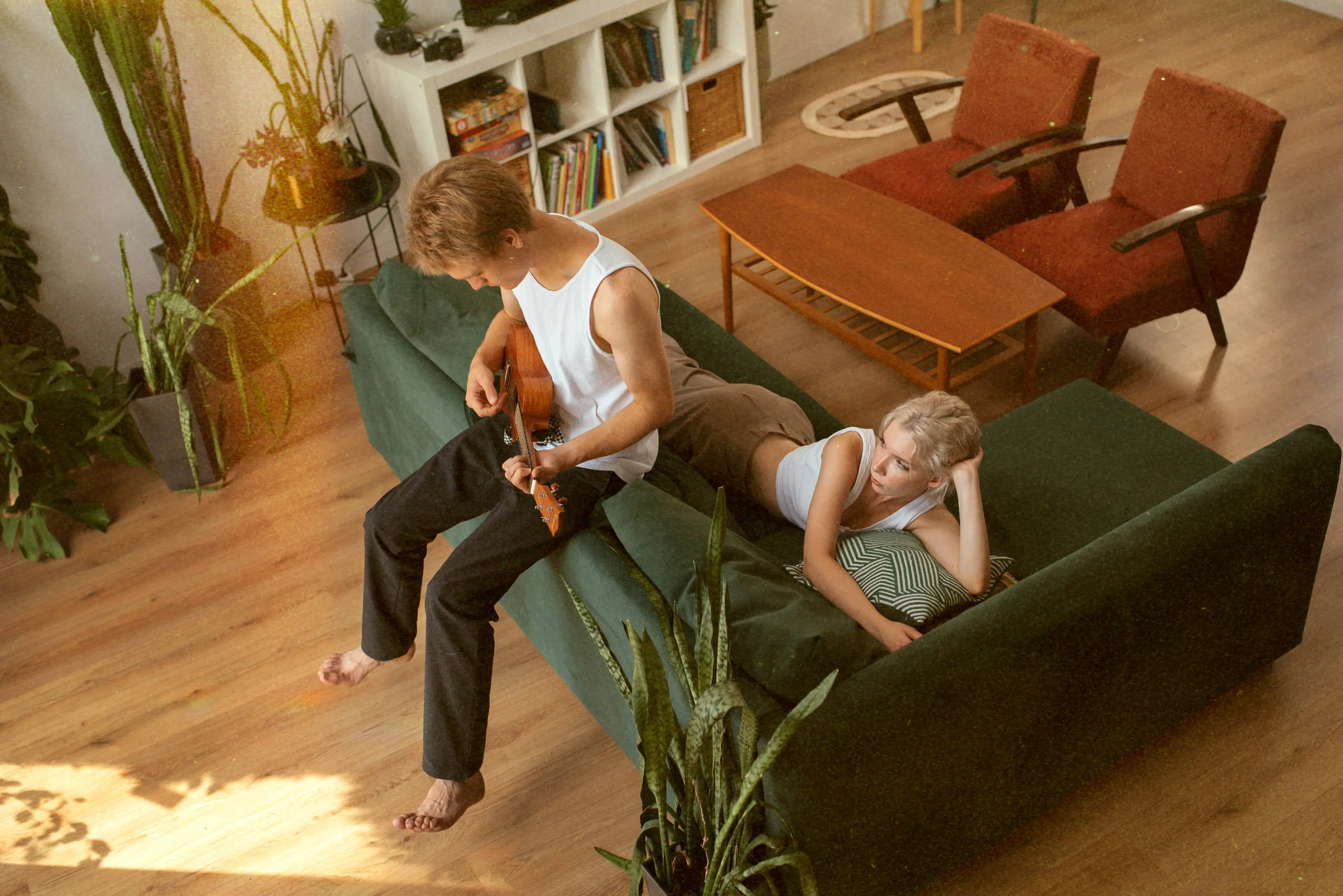 high-angle-man-playing-ukulele