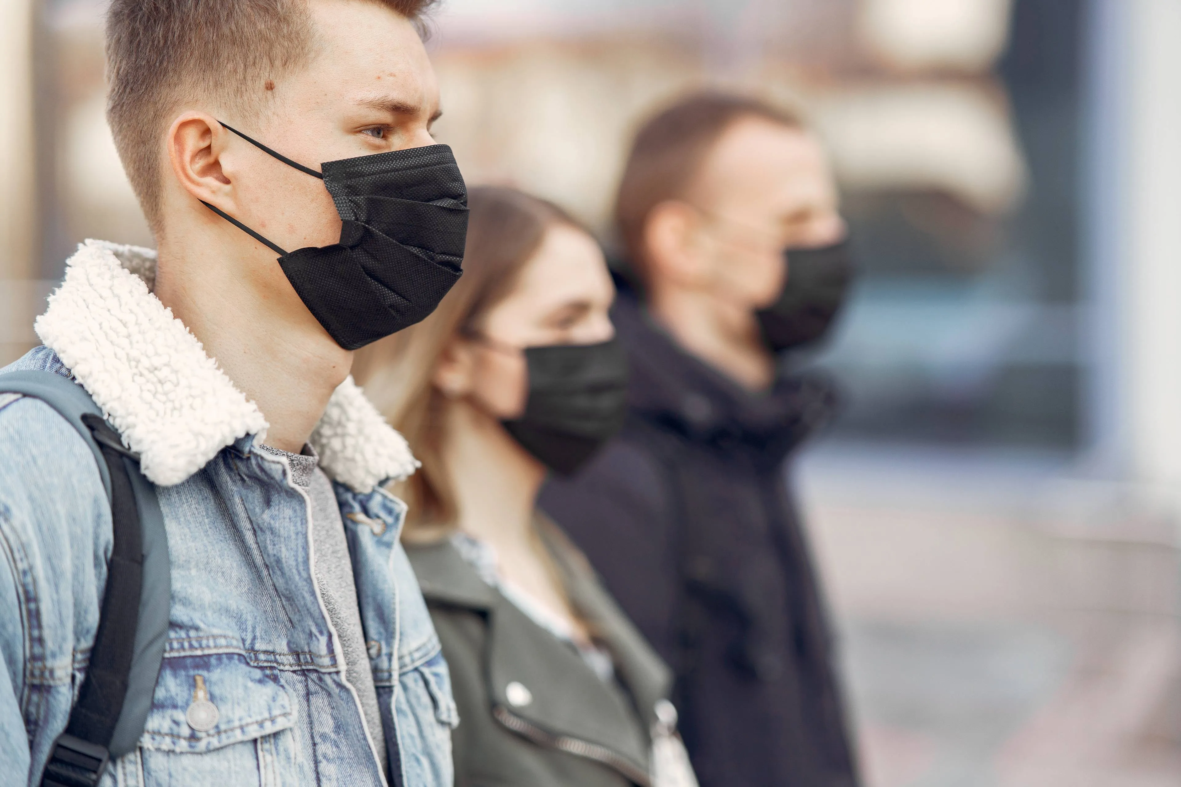 people-masks-stands-street