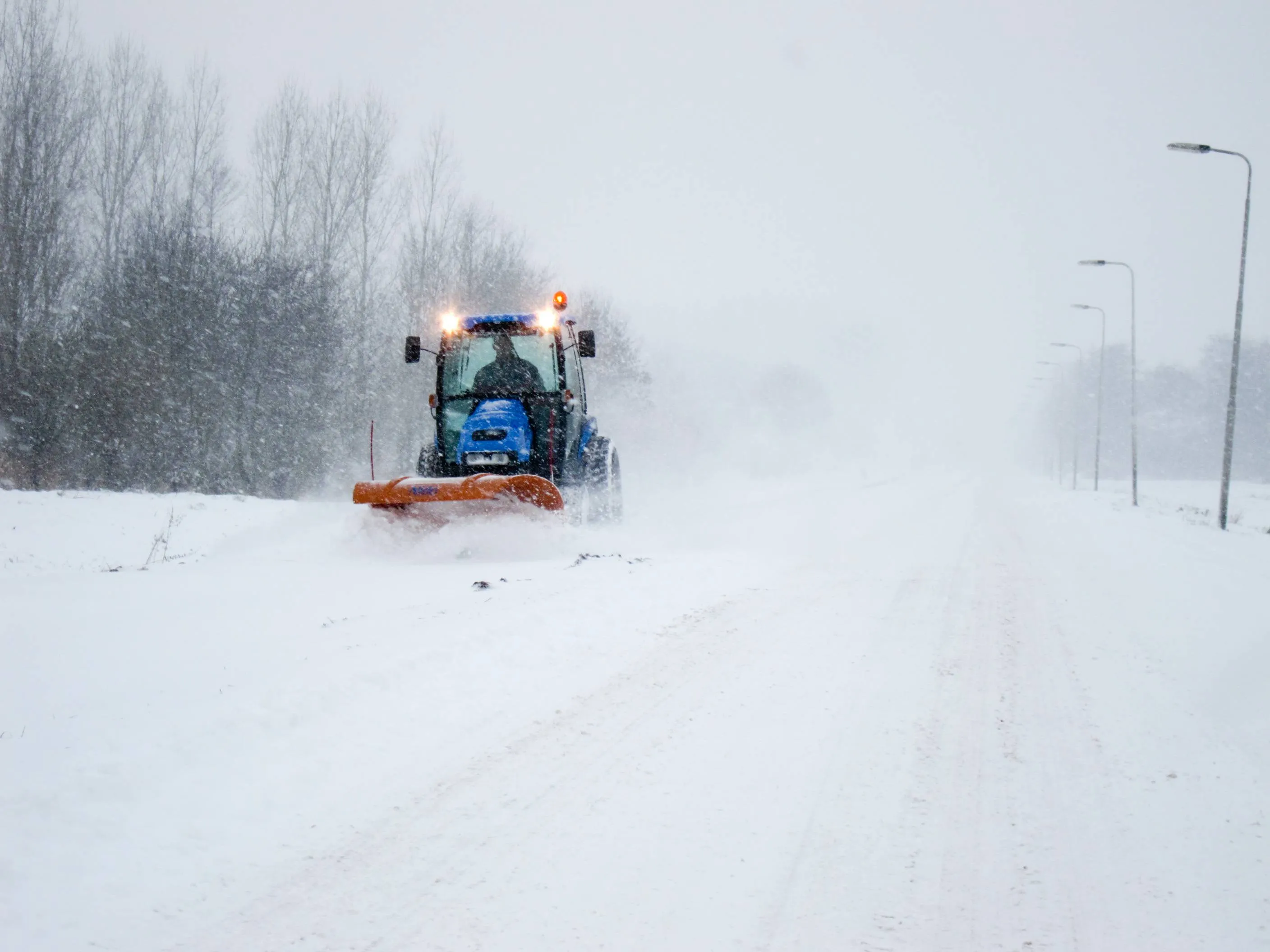view-snow-covered-road-against-sky