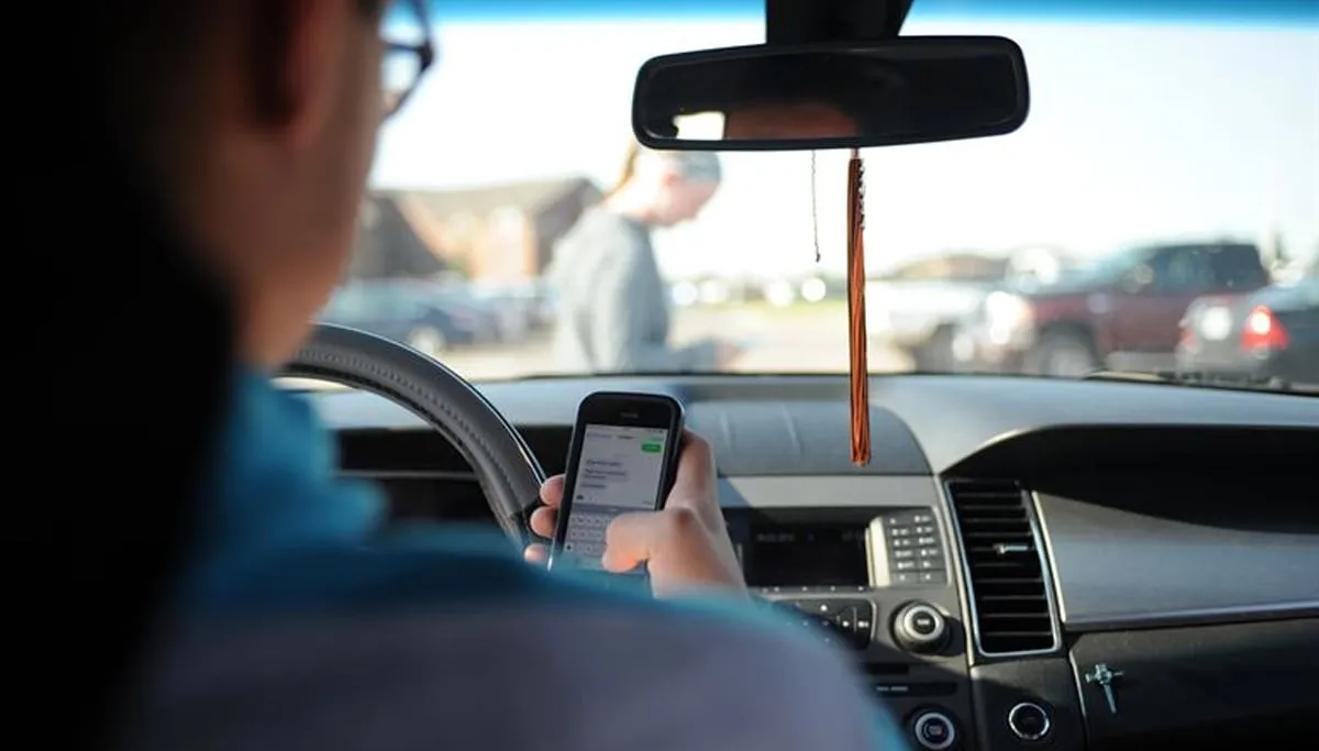 appen achter het stuur