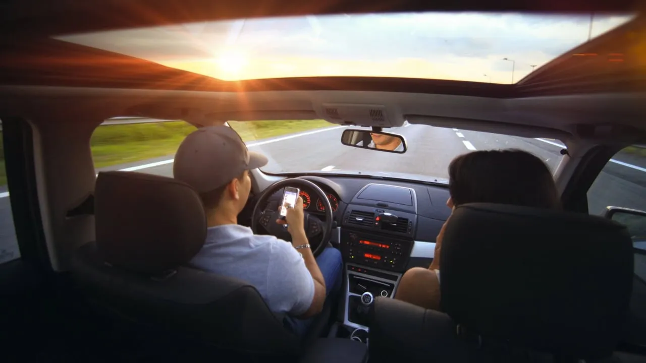 appen achter het stuur