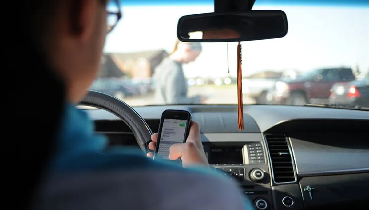 appen achter het stuur