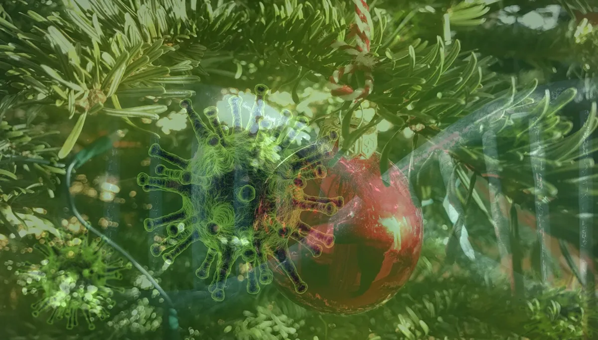 coronavirus en kerstboom met kerstbal