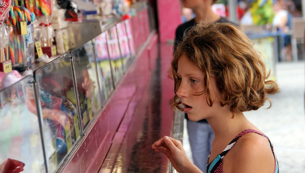 kermis keuzeprobleem voor de snoepkraam