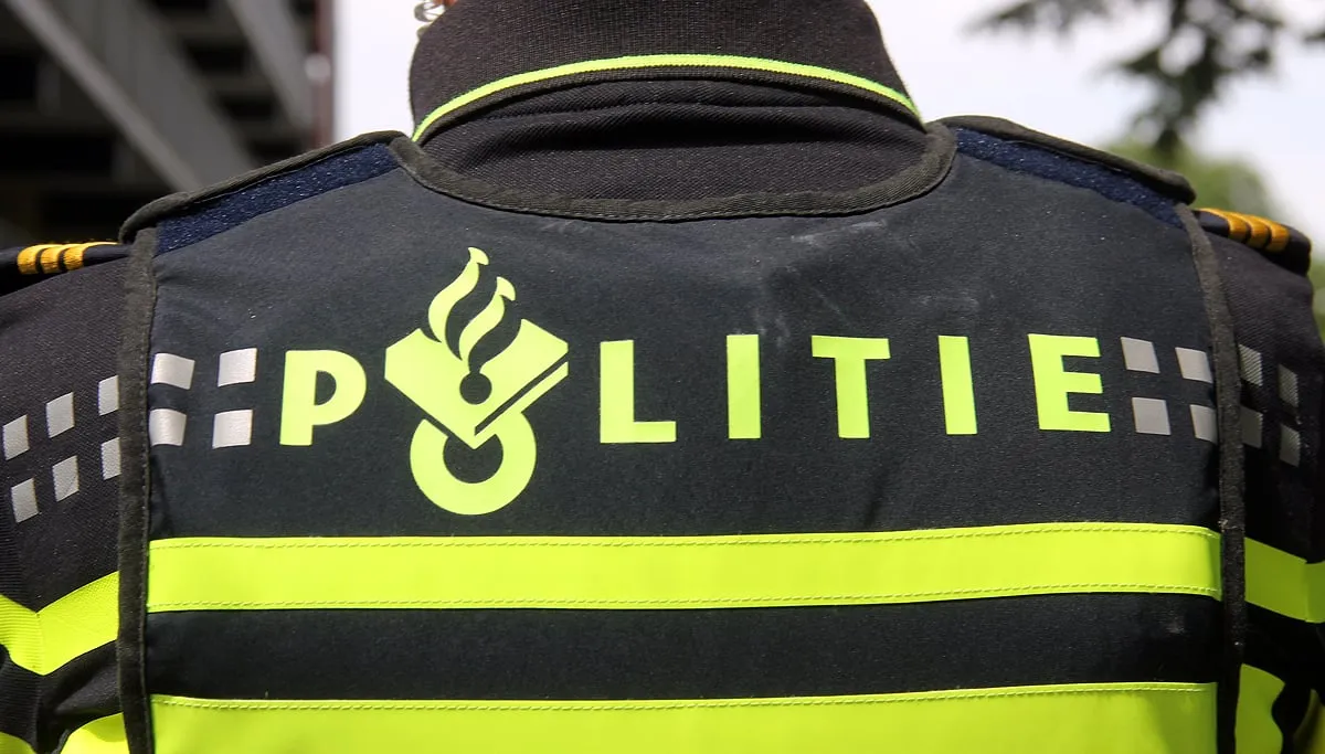 politie rug politieman
