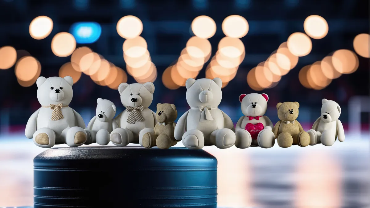 teddyberen en zwarte hockey puck op ijsbaan wazig verlichte nacht indoor sportarena