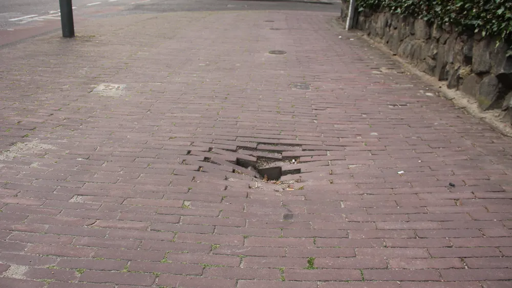 x9h9uxom8xnjcbedvd909igdj buitenbeter app verzakking wilhelminastraat trottoir 1