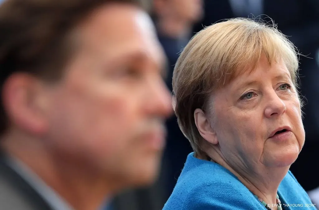 merkel waarschuwt voor zware wintermaanden tijdens pandemie1598612900