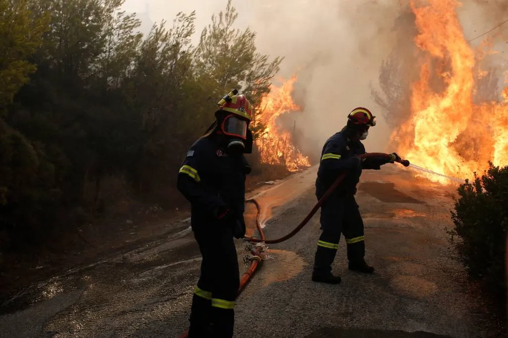 tientallen doden door bosbranden griekenland1532394491
