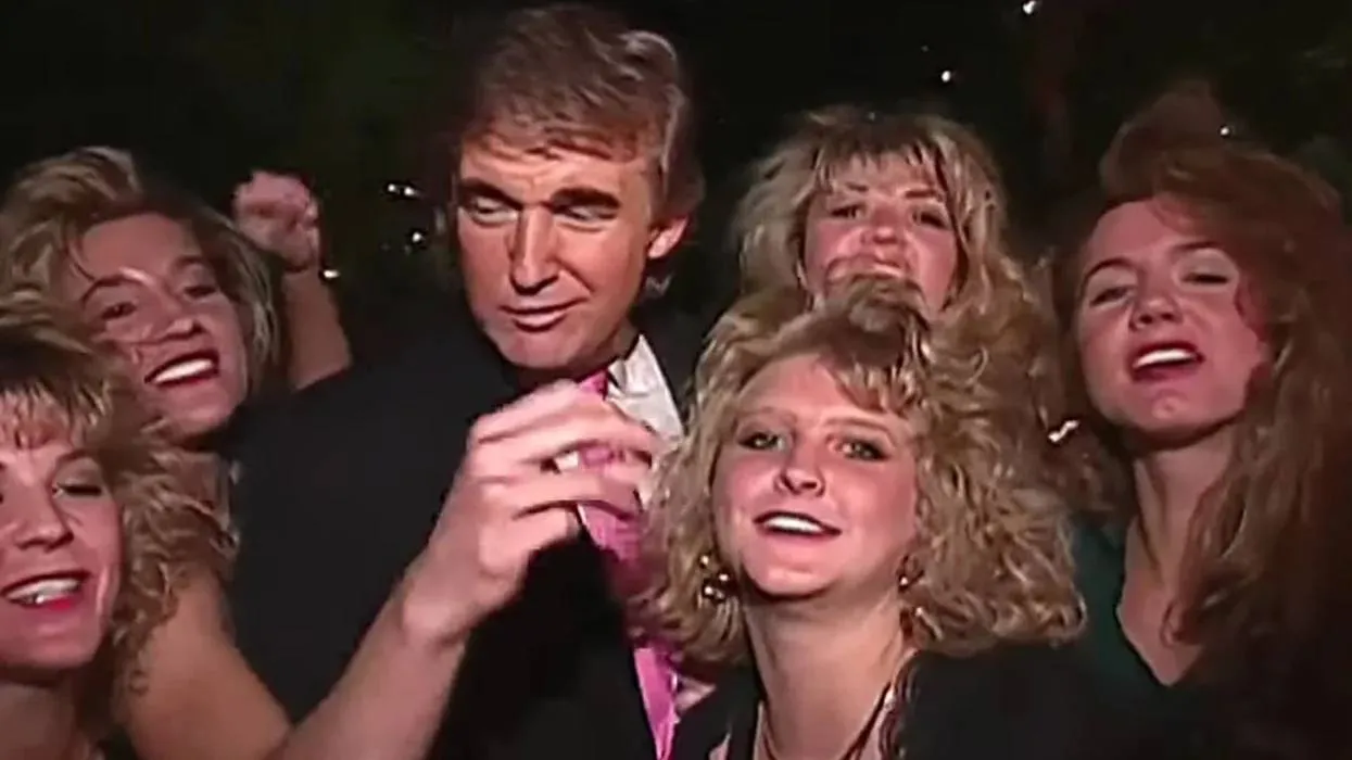 newly-revealed-video-shows-trump-and-jeffrey-epstein-ogling-cheerleaders-at-mar-a-lago-party