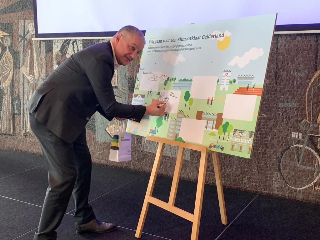 wethouder erik peters bij bijeenkomst klimaatklaar gelderland