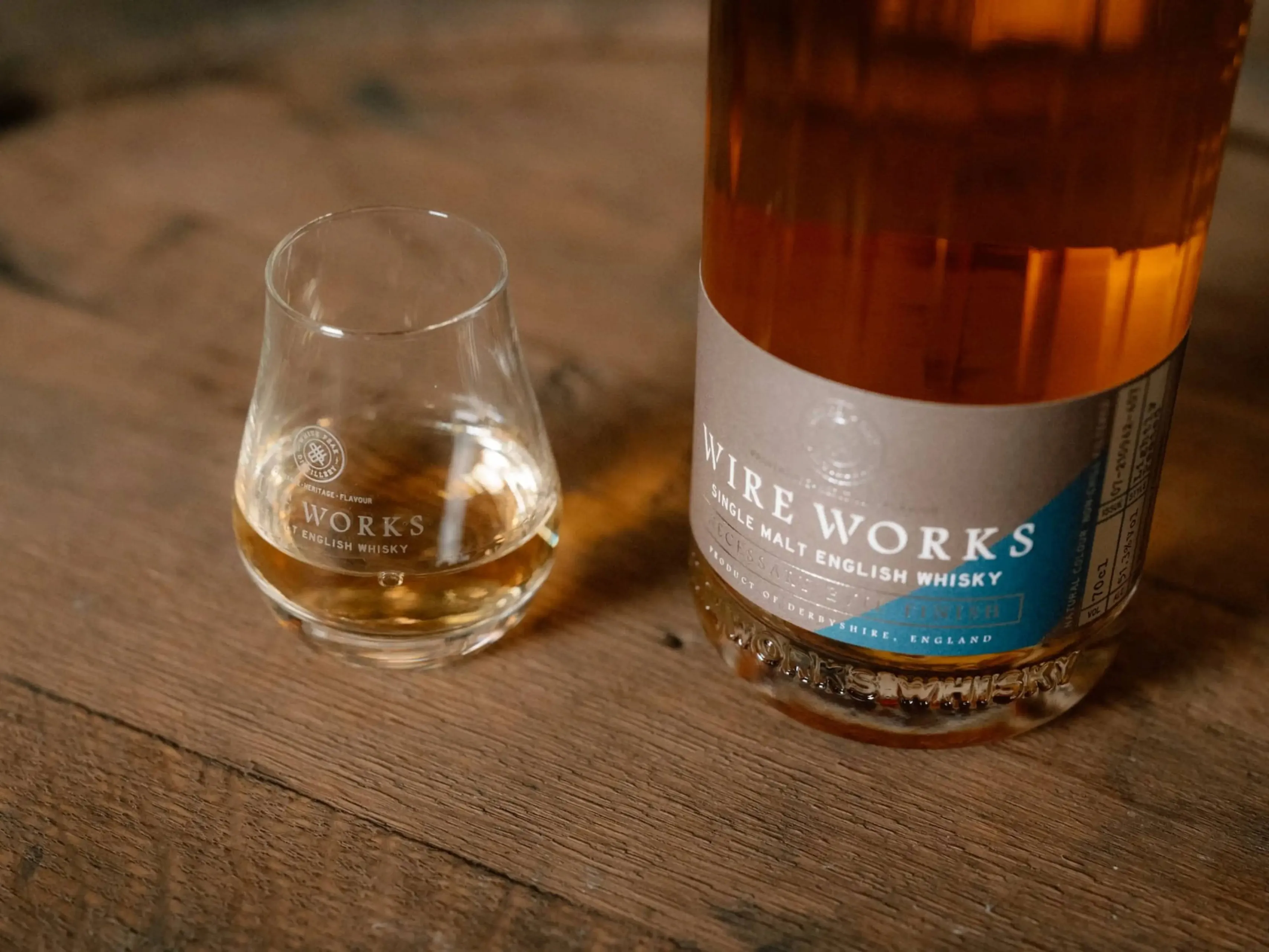 White Peak Necessary Evil Imperial Stour Cask finish whisky with glass