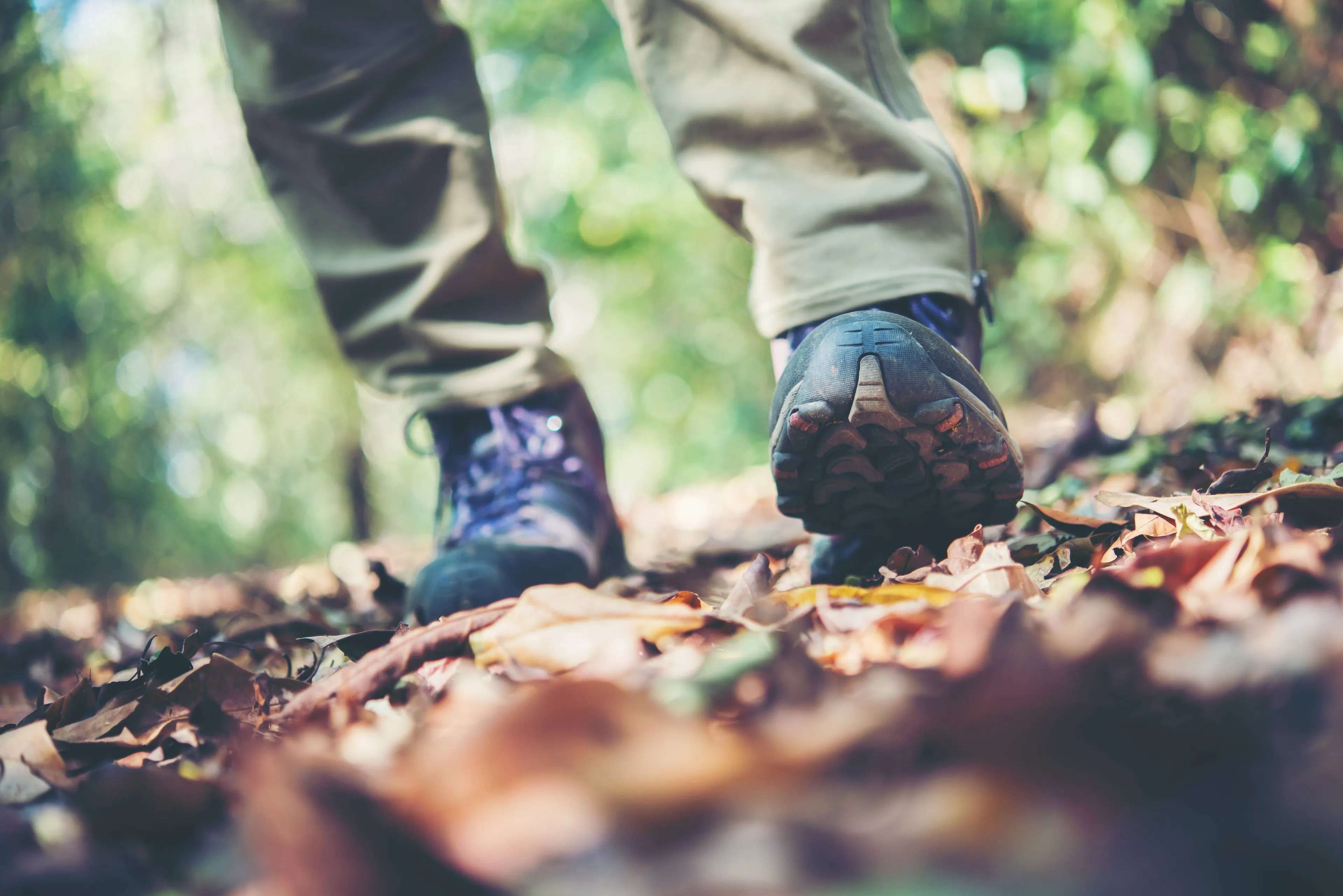 close-up-adventure-woman-feet-walk-mountain-path