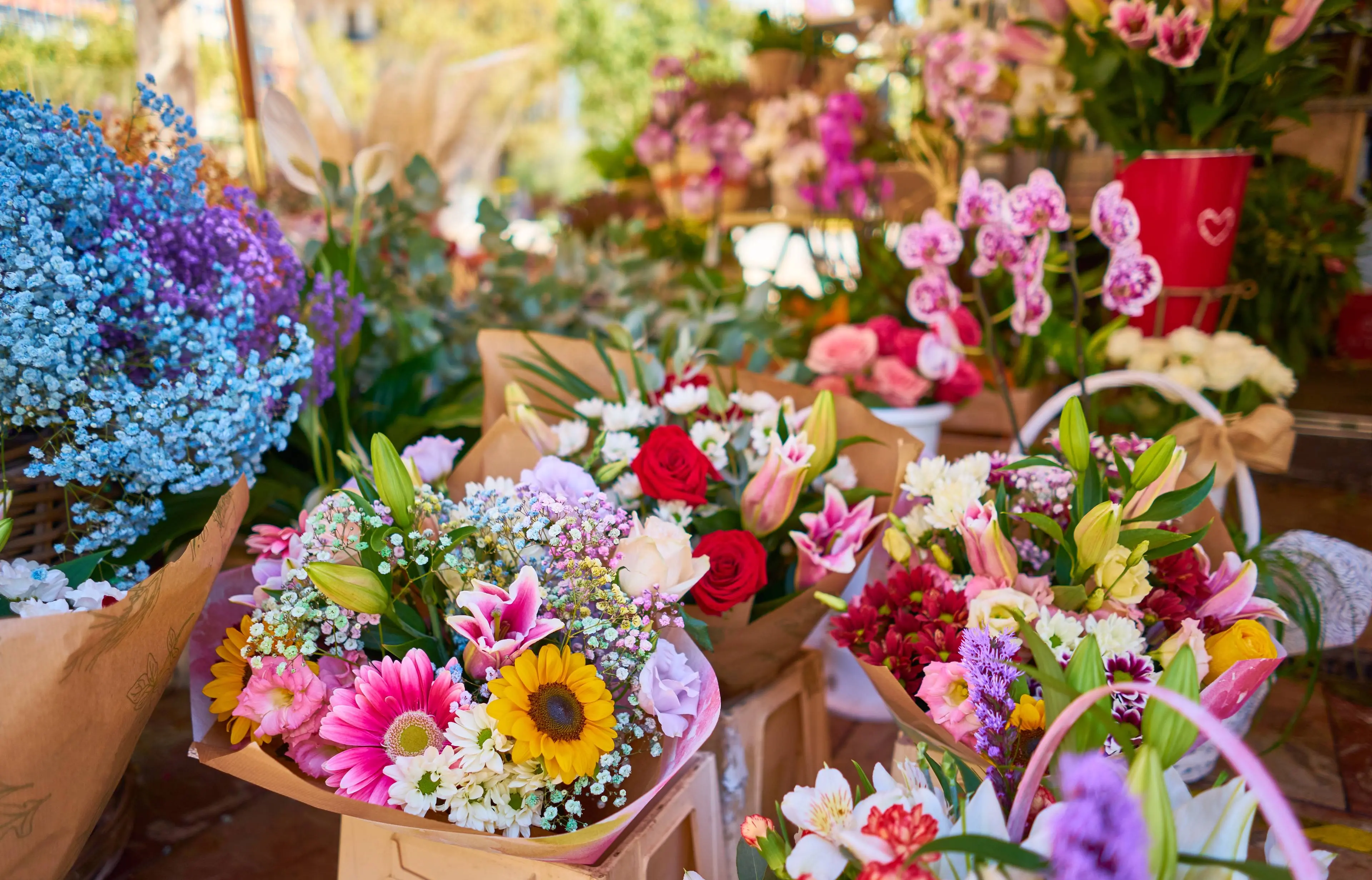 closeup-colorful-flower-bouquets-containers-outdoor-shop