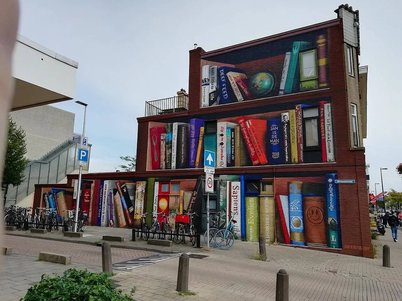 muurschildering boekenkast janisdeman wikipedia
