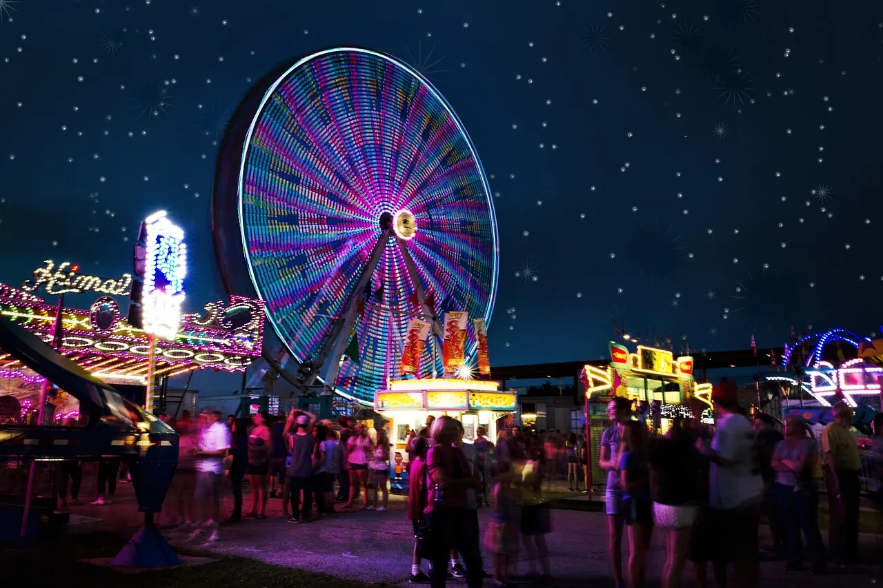 carnival rides 2648047 1280
