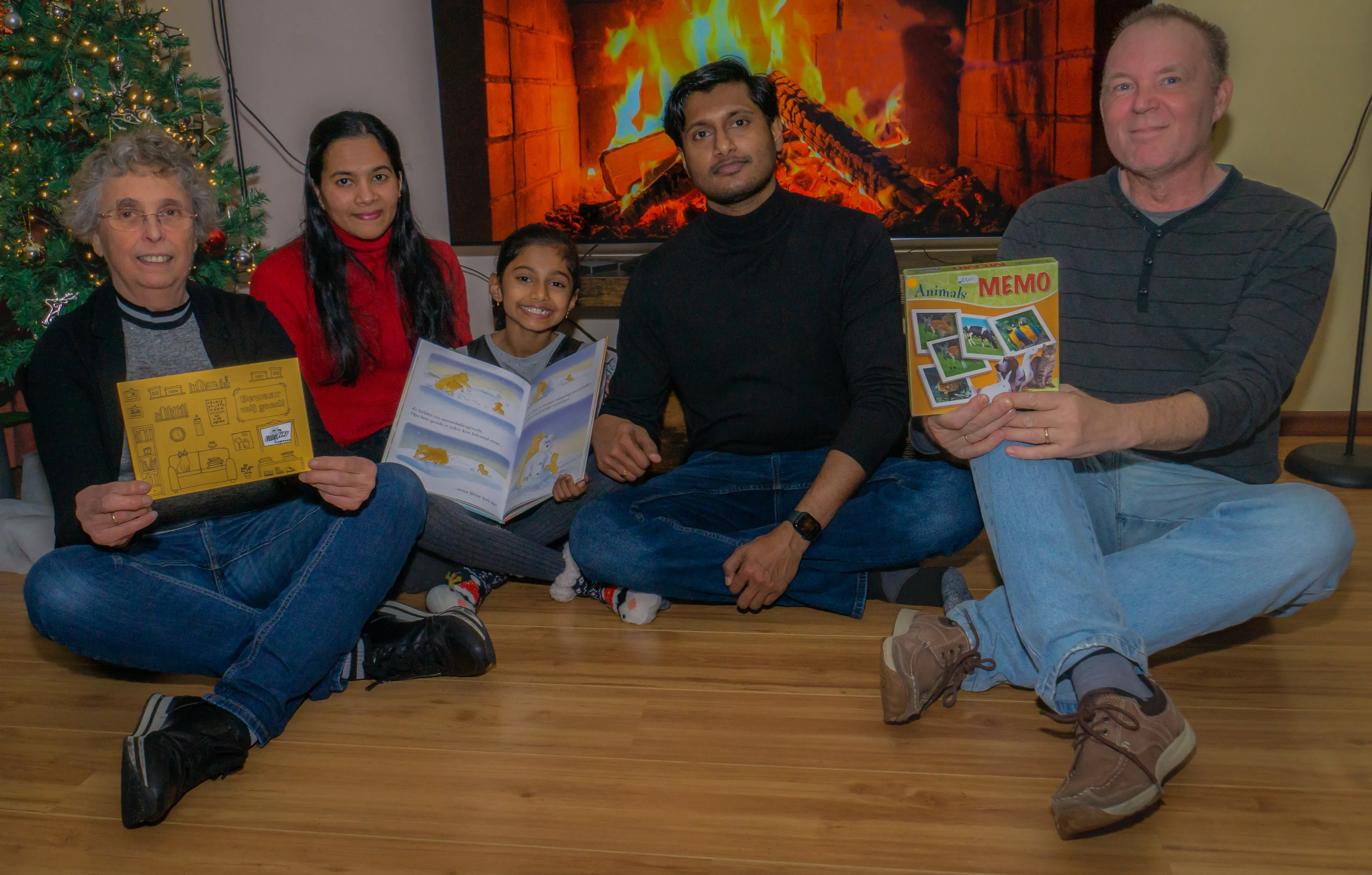 100e gezin ontvangt voorleesexpress fotograaf jeroen stahlecker