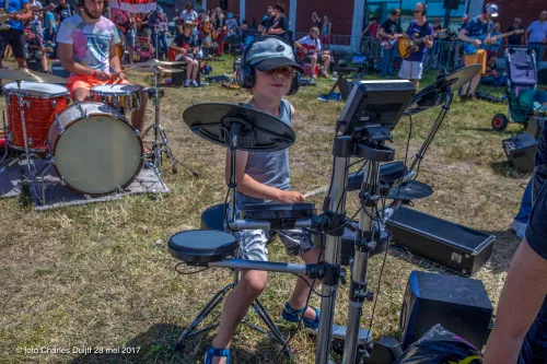 kid behind drums