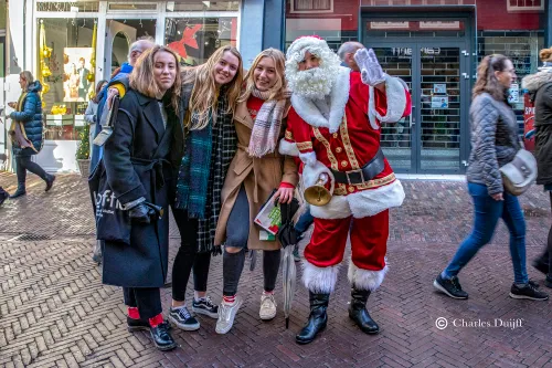 dames met kerstman