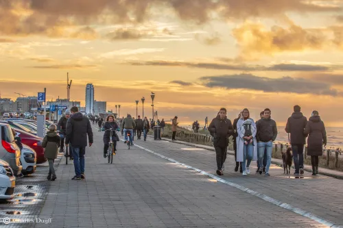 people walking sundown