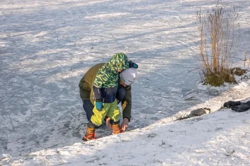 schaatsen halve maan vader zoon