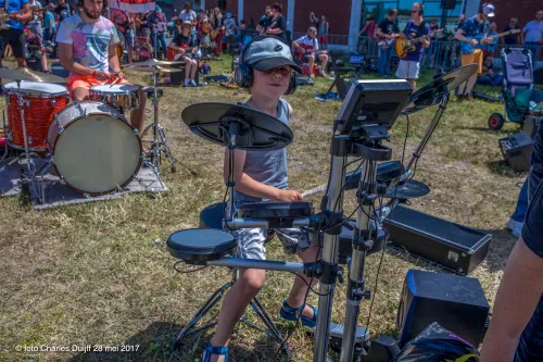 kid behind drums