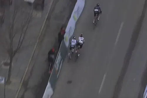 Jan Christen pushes Maxim van Gils into the barriers at the 2026 Clasica Jaen Paraiso Interior