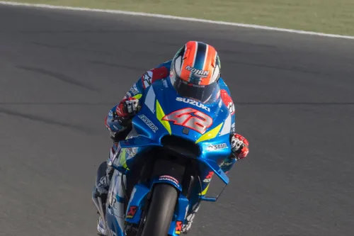 DOHA, QATAR - MARCH 08: Alex Rins of Spain and Team Suzuki ECSTAR heads down a straight during the MotoGP of Qatar - Free Practice at Losail Circuit on March 08, 2019 in Doha, Qatar. (Photo by Mirco Lazzari gp/Getty Images)