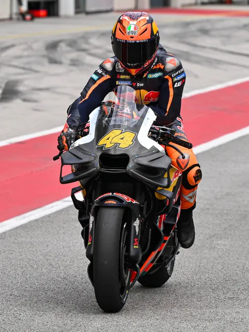 KTM with new black components at Sepang test