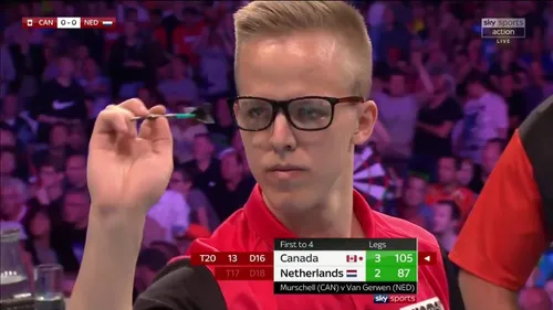 Dawson Murschell against Michael van Gerwen at the World Cup of Darts