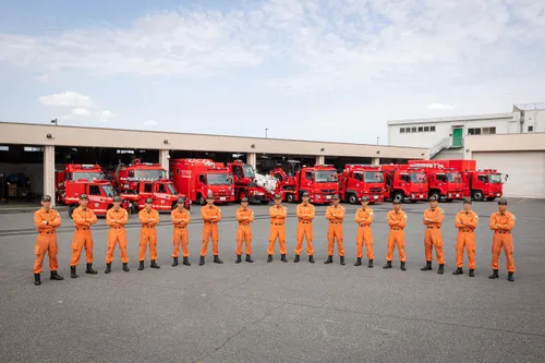 hyper rescue members line up in front of special vehicles