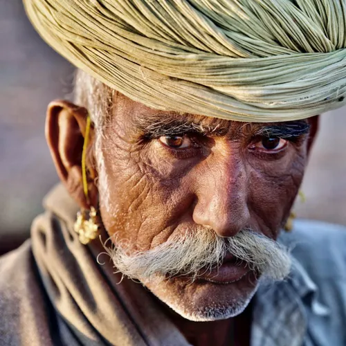 a trader at the pushkar camel fair rene richard 1024x1024