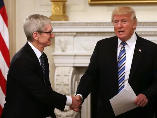 trump tim cook handshake getty