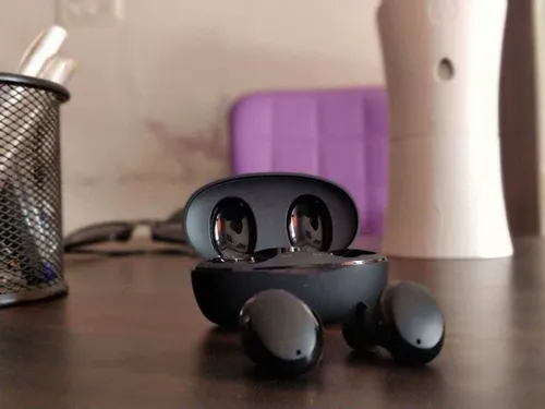 baseus encok w11 true wireless earbuds on table view