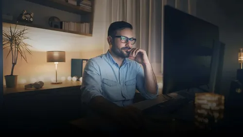 it administrator working remotely on desktop darkened rwd