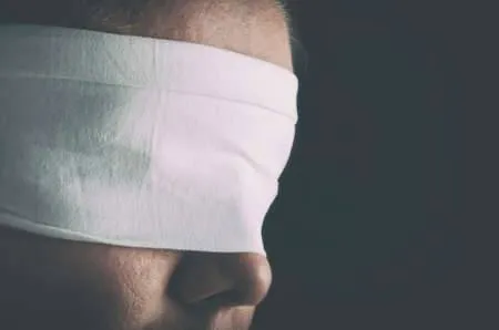 85809252-blindfolded-woman-closeup-concept-of-censorship-human-rights-oppression-or-repression