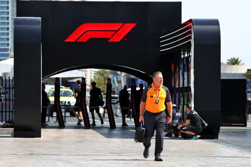 Zak Brown, CEO of McLaren, arriving in the F1 paddock
