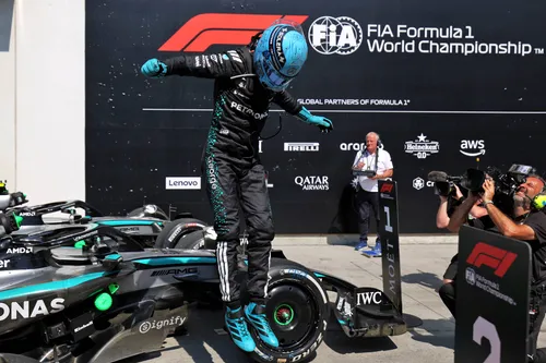 George Russell celebrating his victory in Canada